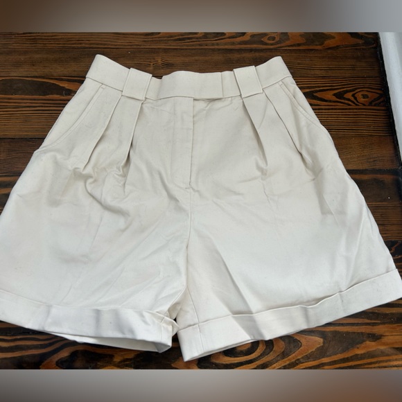 Cream color shorts. - Picture 1 of 3